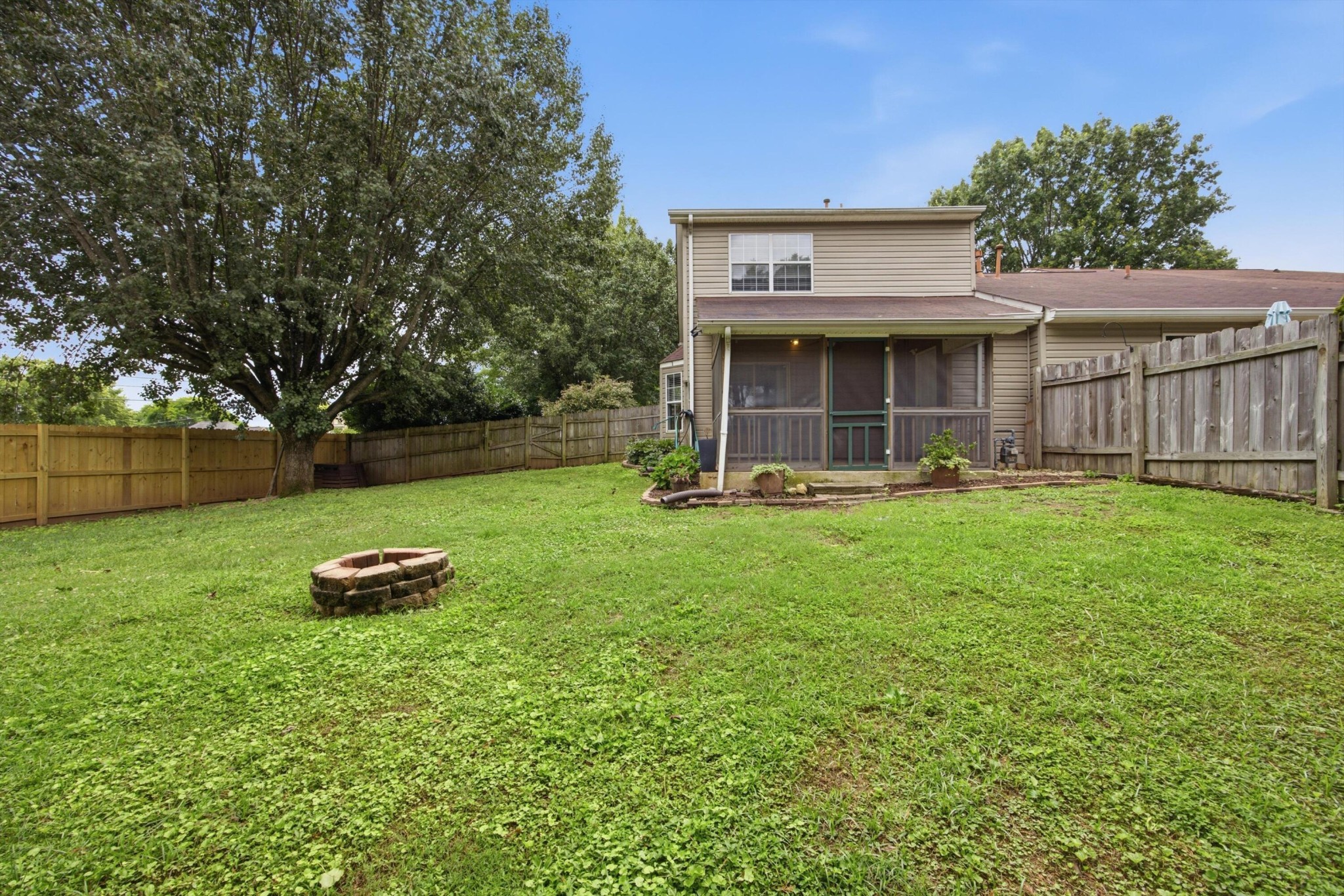 6729 Hickory Trace Circle Chattanooga, TN 37421 - Photo 26 of 30 a front view of a house with a yard