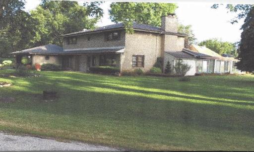 124 East Monterey Avenue Schaumburg, IL 60193 - Photo 1 of 1 a view of a house with a yard