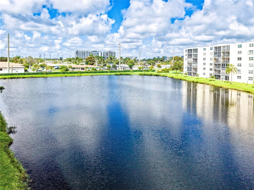 321 Southeast 3rd Street, Unit 307 Dania Beach, FL 33004 - Photo 19 of 21 a view of swimming pool and city view