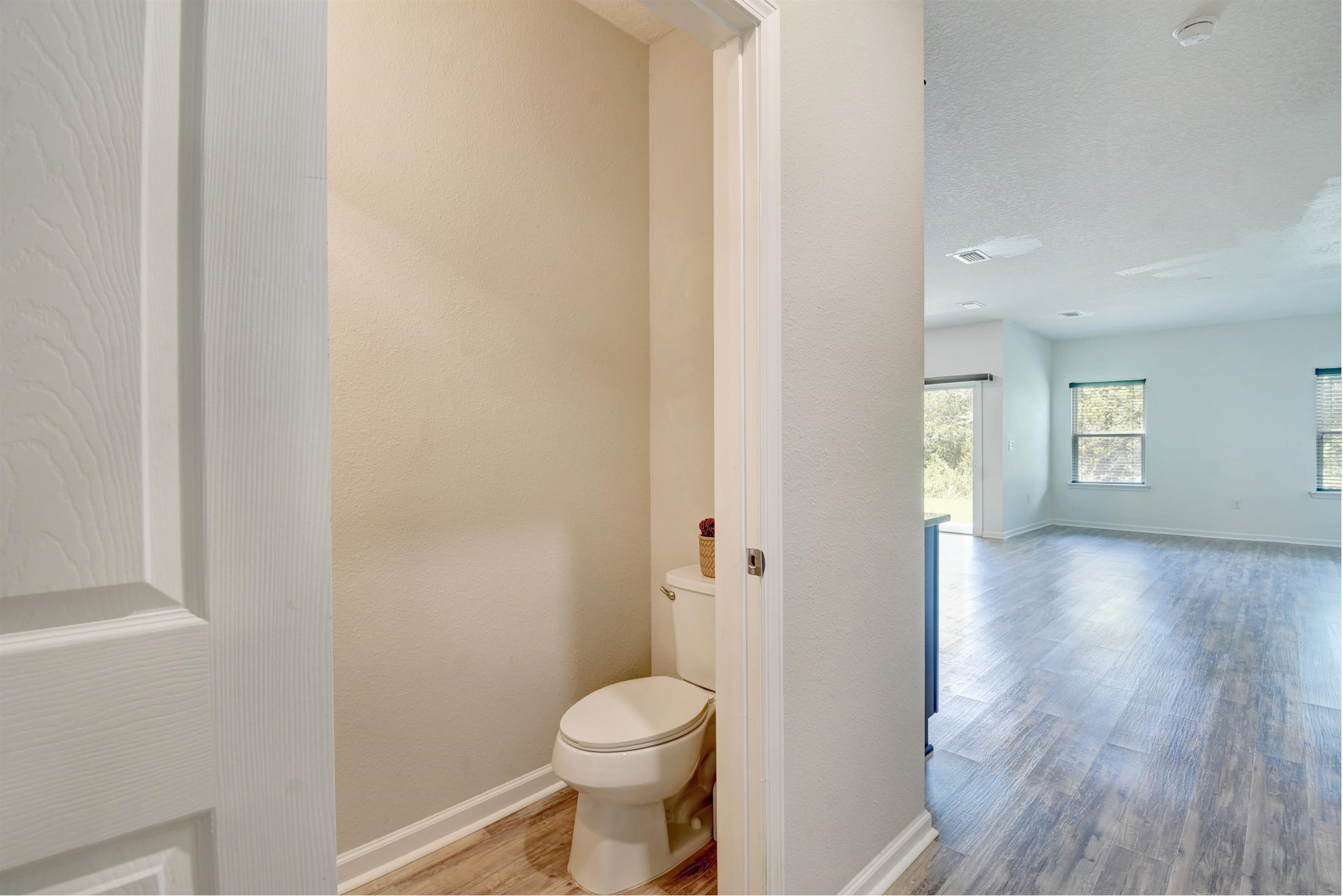 9 Bella Vita Way Ormond Beach, FL 32174 - Photo 11 of 36 a bathroom with a toilet and a sink