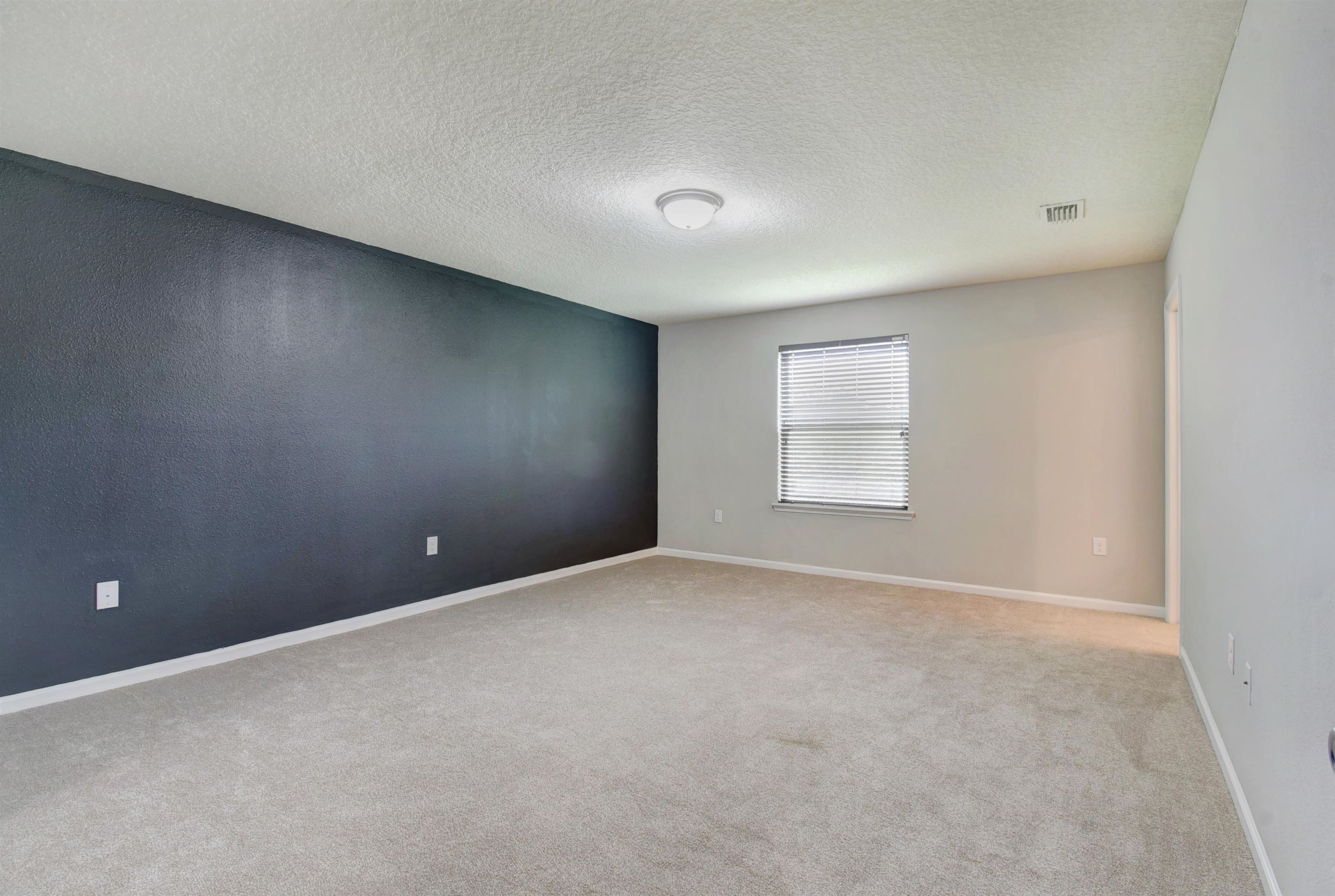 9 Bella Vita Way Ormond Beach, FL 32174 - Photo 15 of 36 a view of an empty room with a window