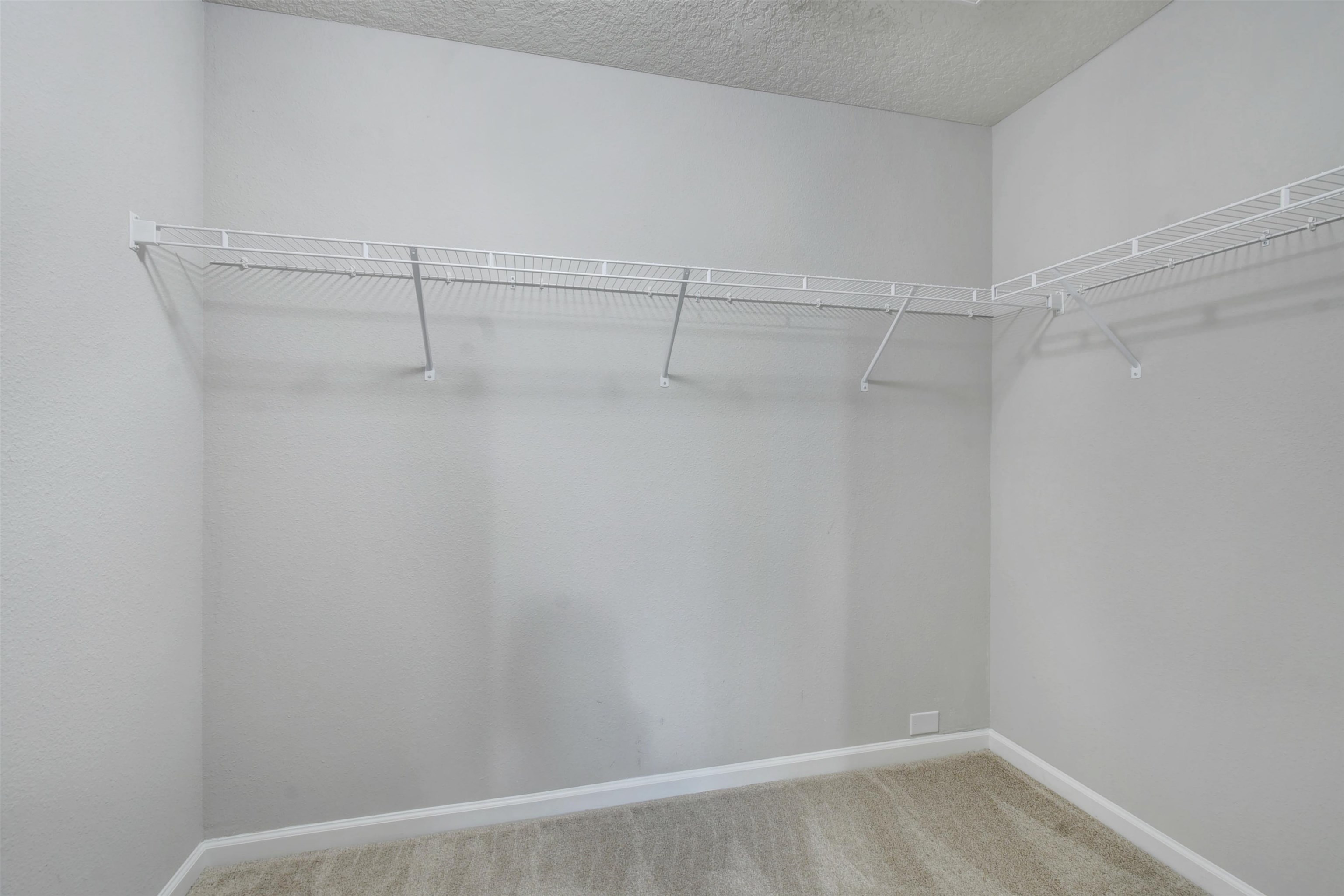 9 Bella Vita Way Ormond Beach, FL 32174 - Photo 19 of 36 a view of a room with racks on the wall