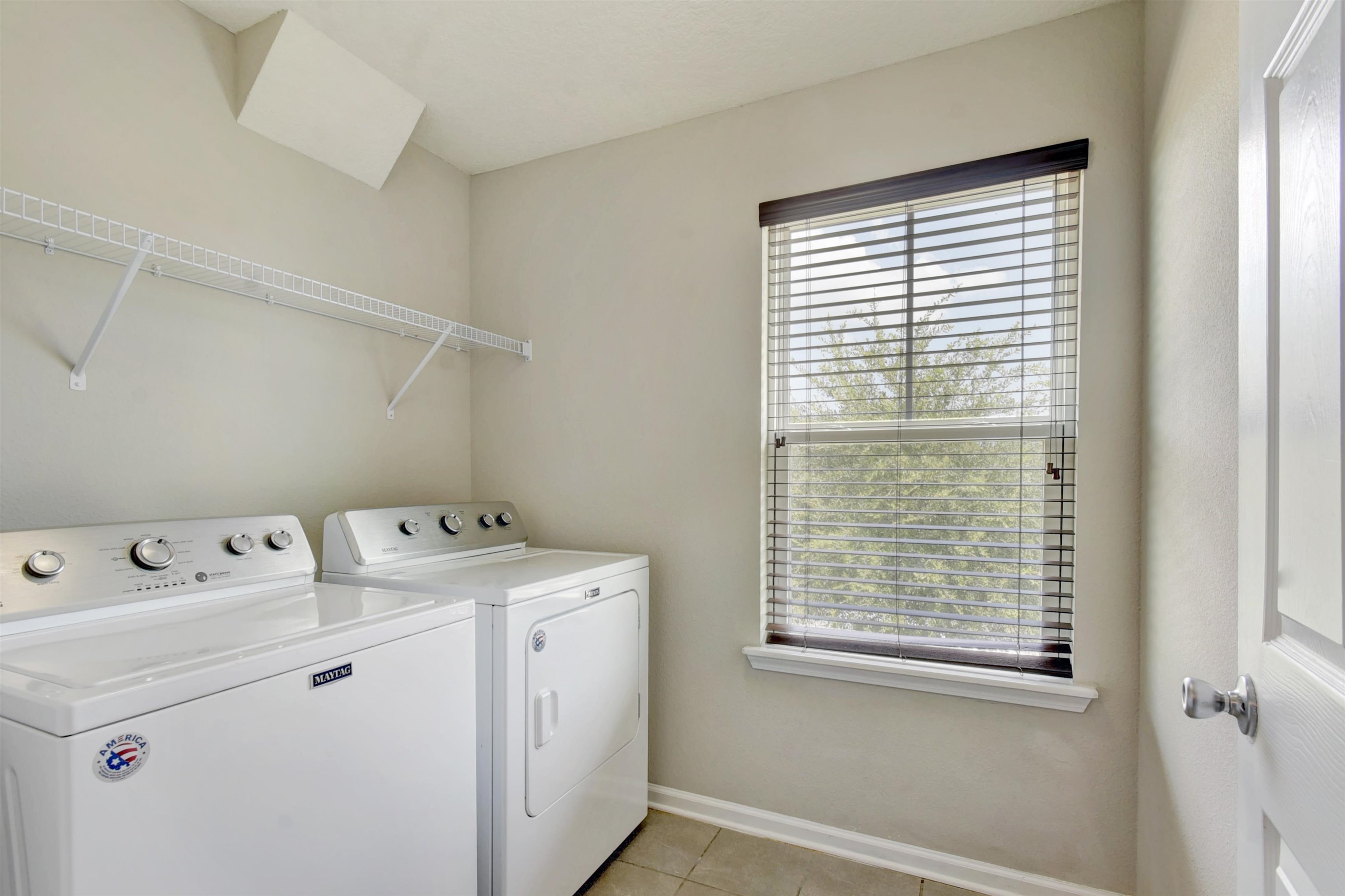 9 Bella Vita Way Ormond Beach, FL 32174 - Photo 21 of 36 a utility room with dryer and washer