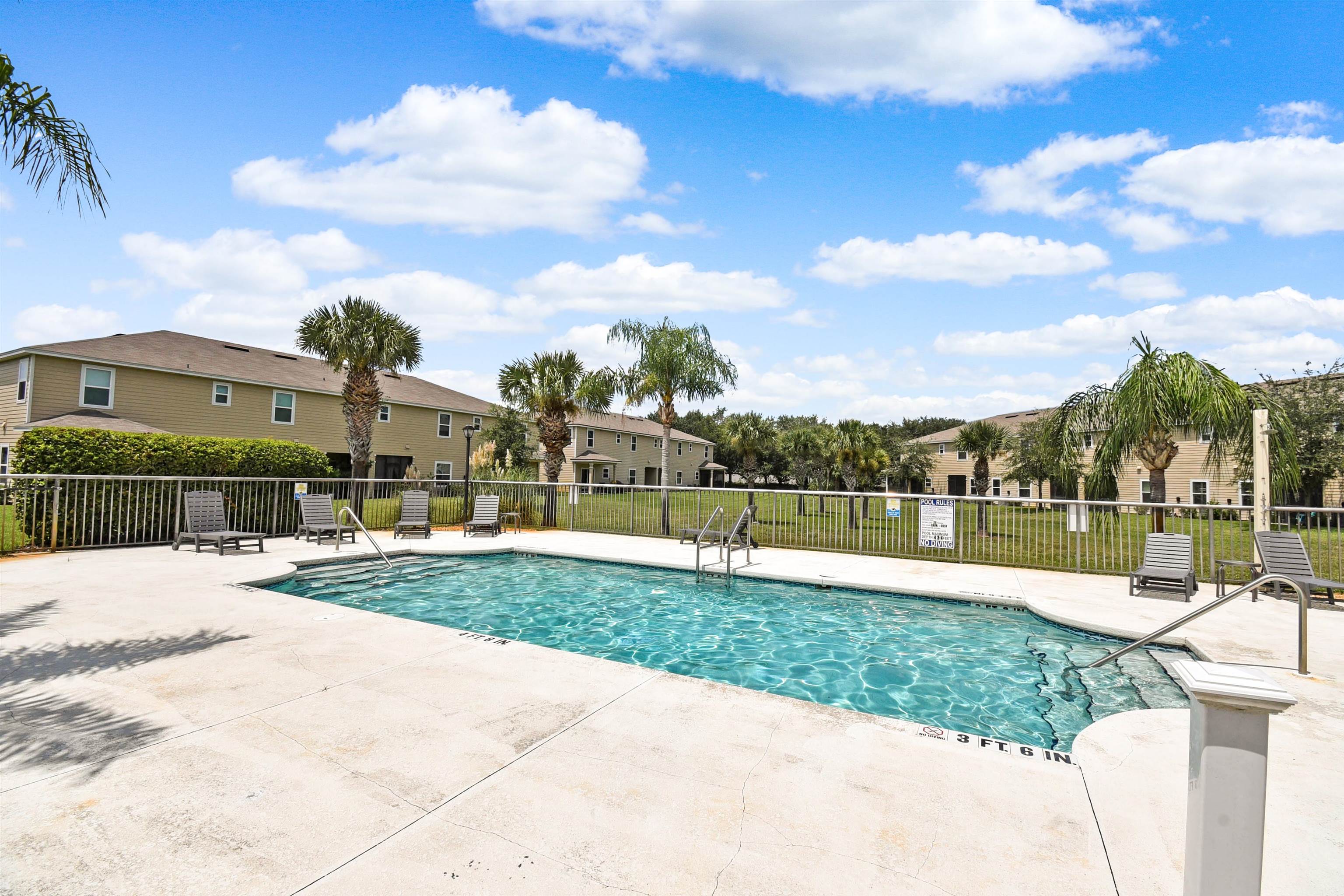 9 Bella Vita Way Ormond Beach, FL 32174 - Photo 32 of 36 a view of a lake and a yard