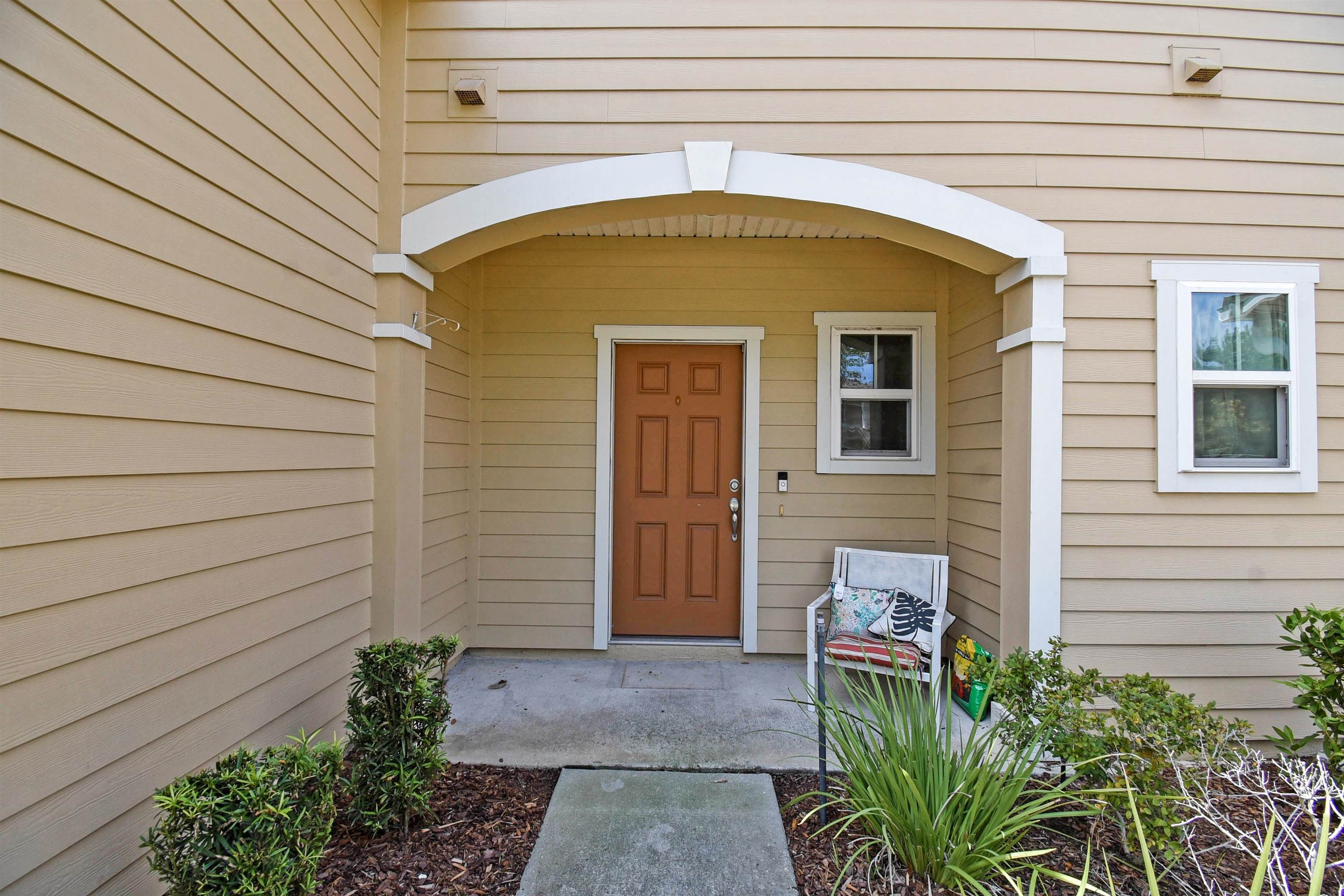 9 Bella Vita Way Ormond Beach, FL 32174 - Photo 33 of 36 a view of front door of house