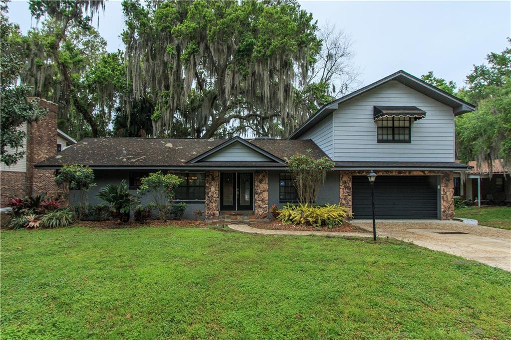 46 Live Oak Road Winter Garden, FL 34787 - Photo 1 of 1 a front view of a house with garden