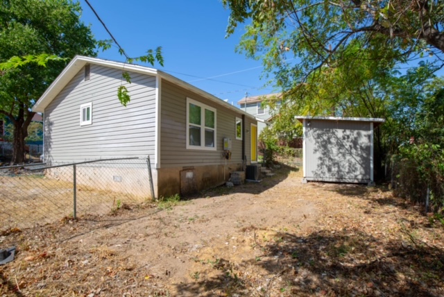 1183 Coleto Street Austin, TX 78702 - Photo 17 of 17 a view of a house with a yard
