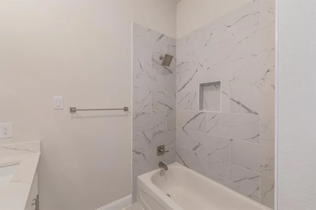 a bathroom with a bathtub