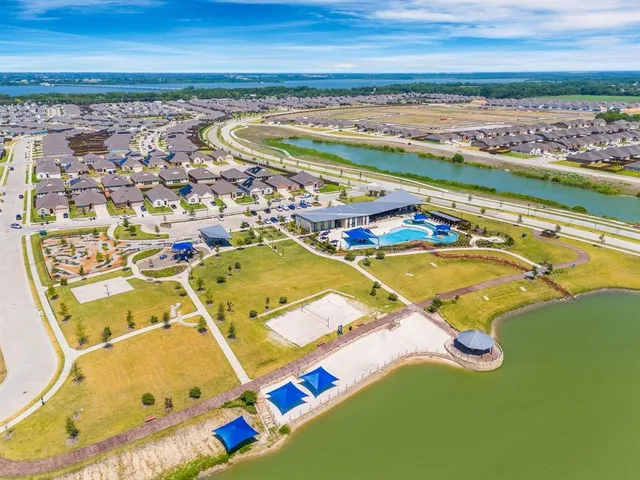 swimming pool with outdoor seating and yard view