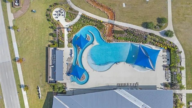 a picture of a bathroom with a sink and mirror