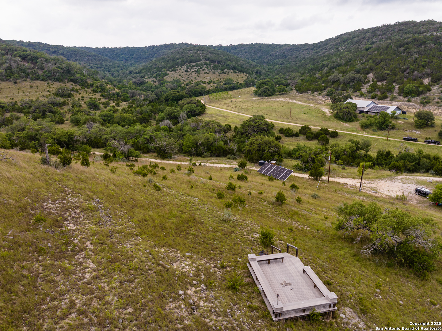 1600 Mickle Creek Road Medina, TX 78055 - Photo 11 of 18 a view of a town with mountains in the background