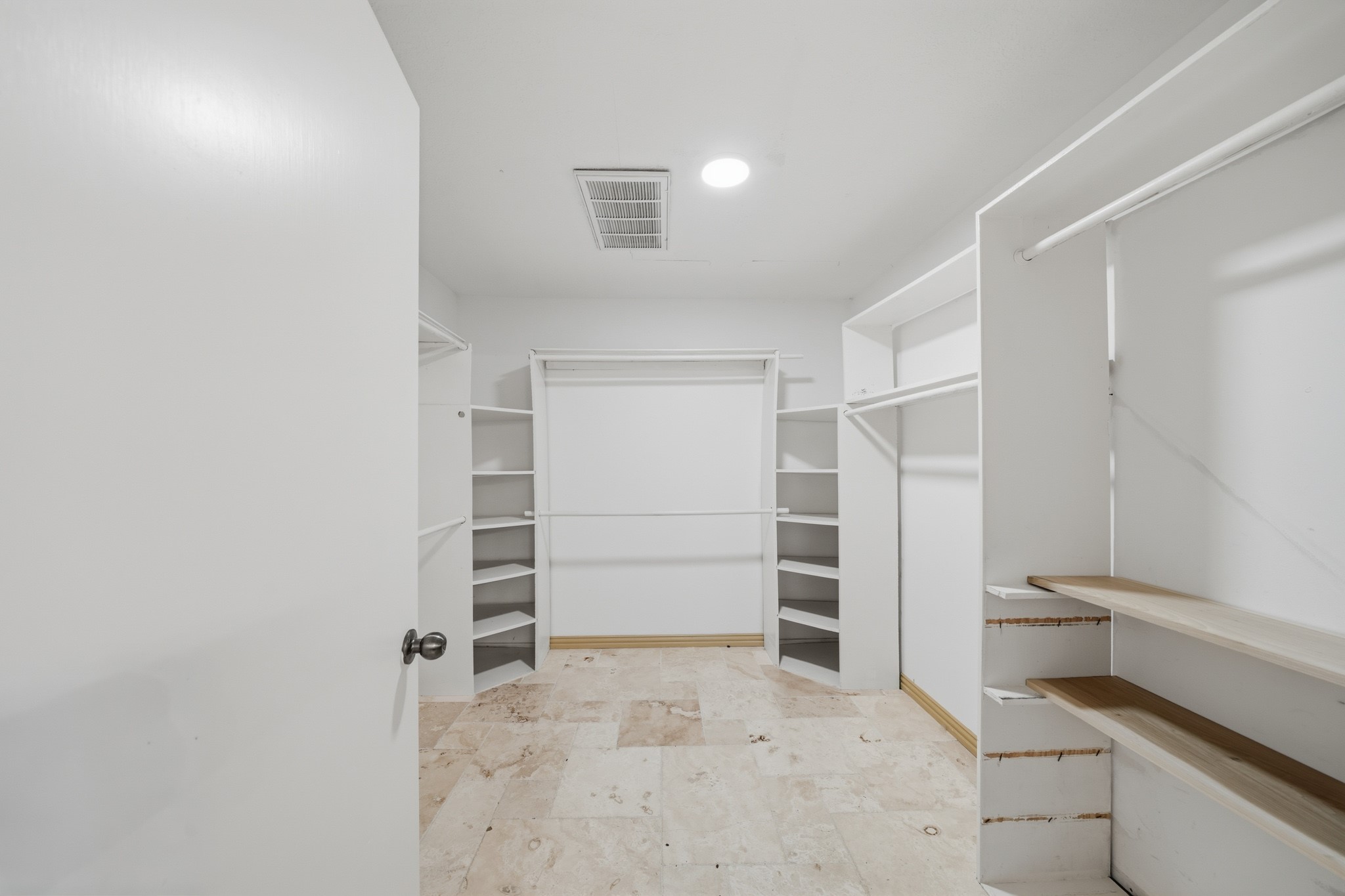 79 Summers Wind Street Conroe, TX 77356 - Photo 26 of 45 a view of an empty walk in closet