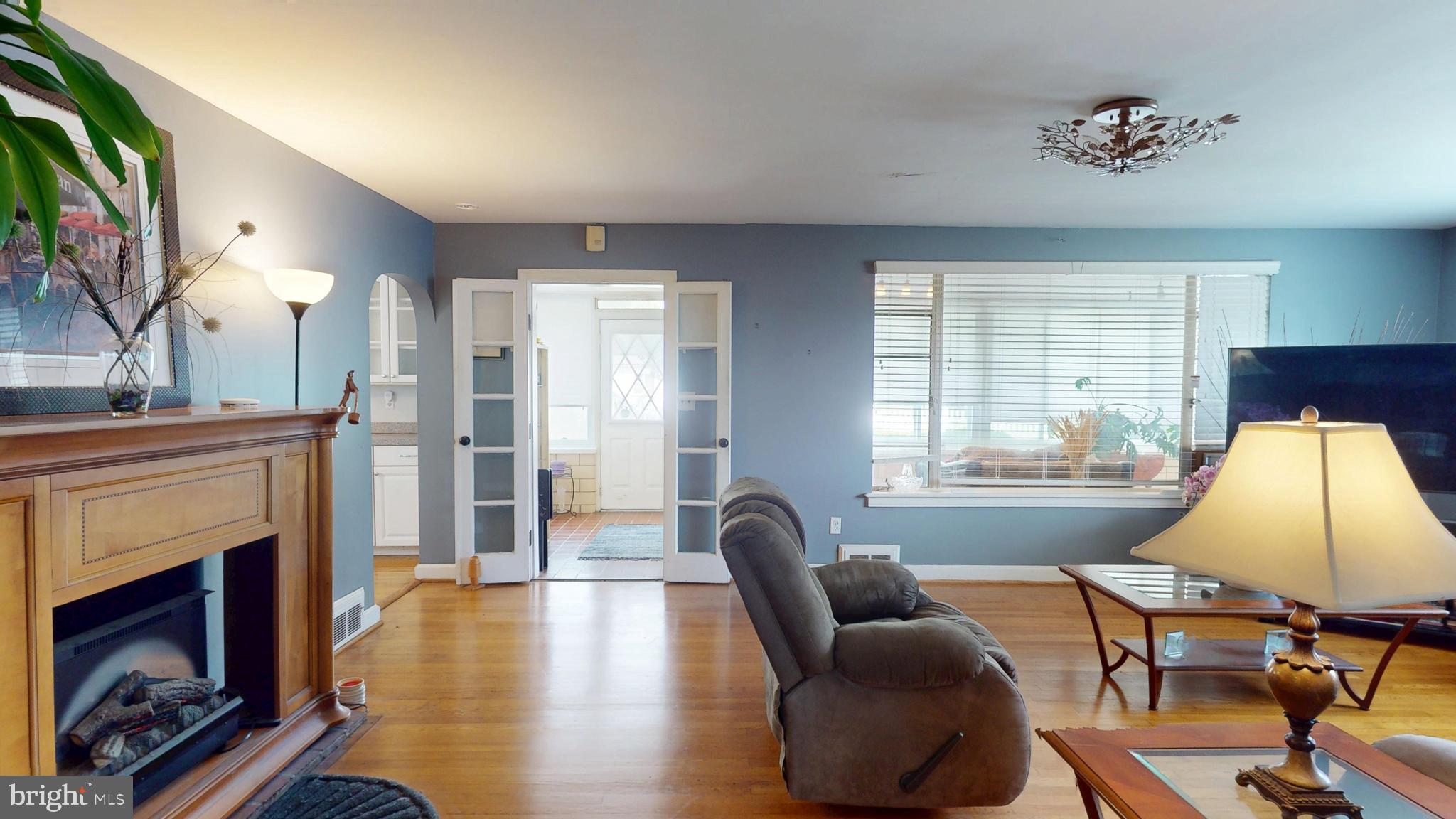 6103 Manor Road Clinton, MD 20735 - Photo 14 of 48 a living room with furniture and a fireplace