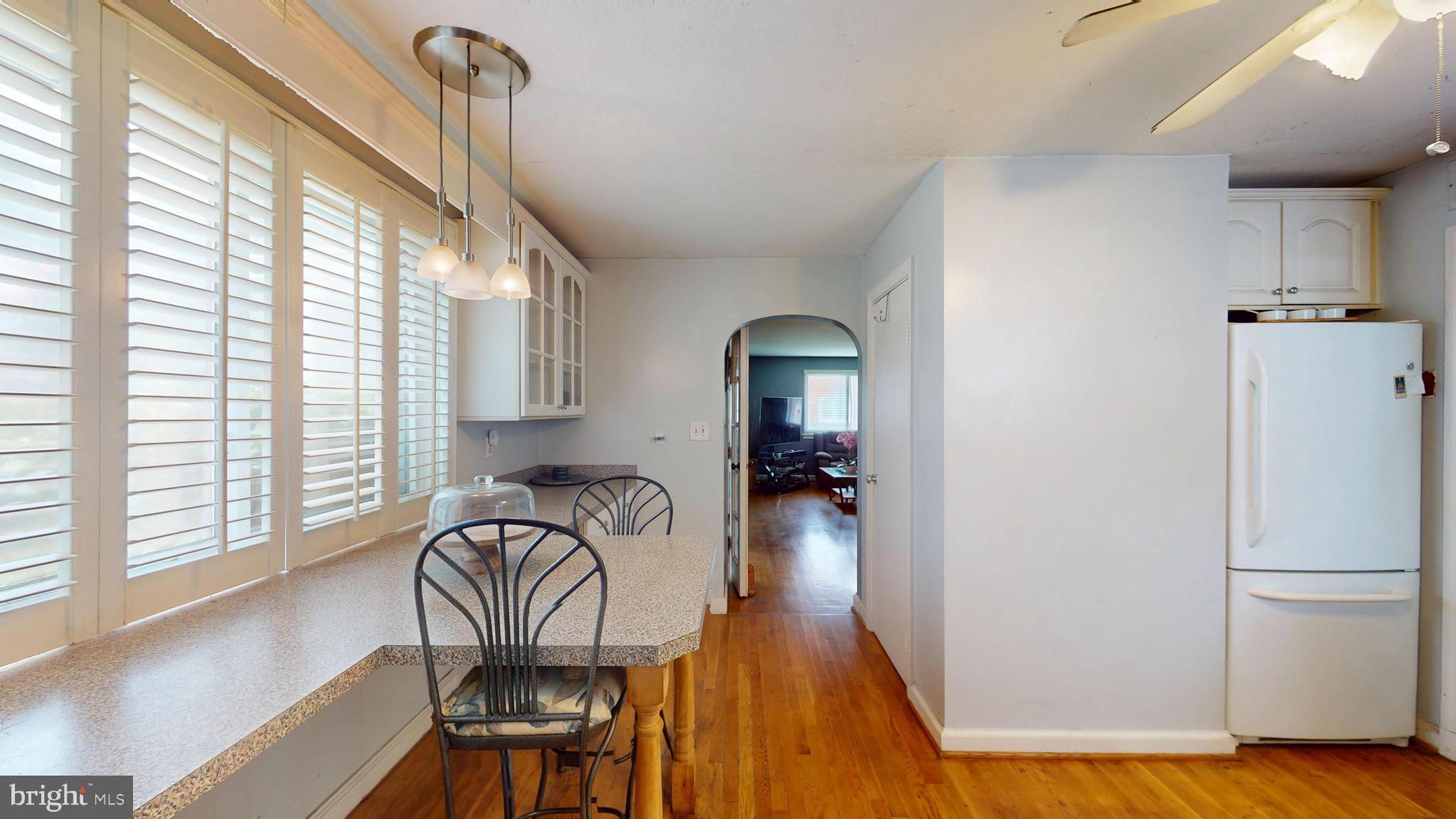 6103 Manor Road Clinton, MD 20735 - Photo 20 of 48 a view of a livingroom with furniture window and wooden floor