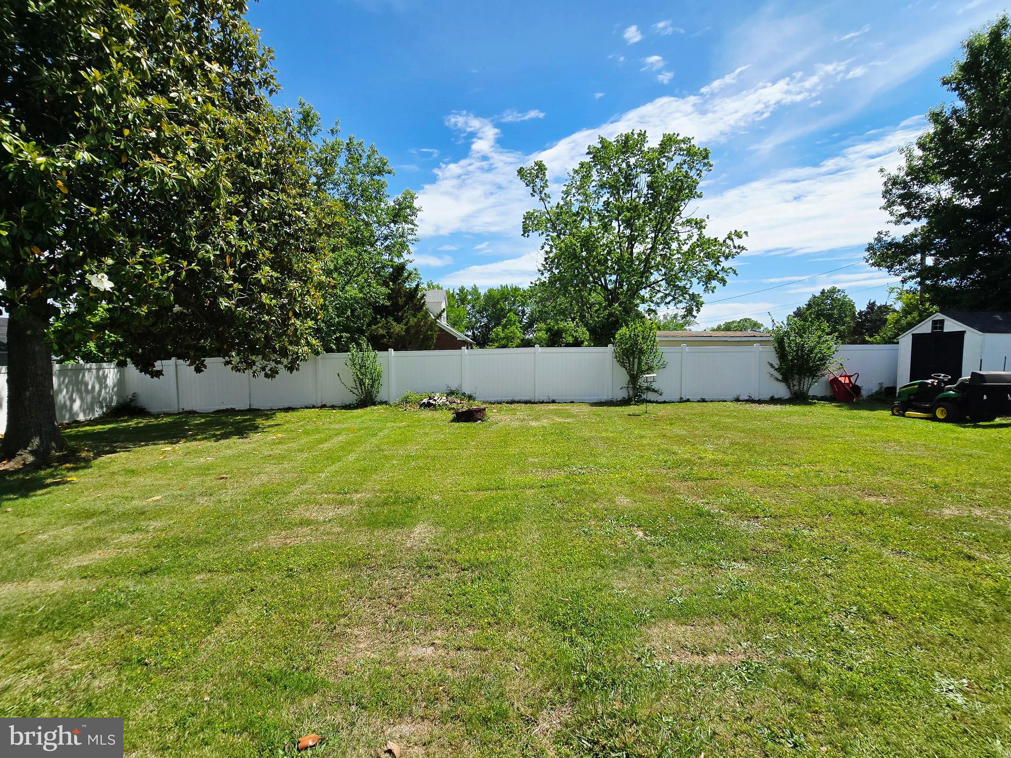 6103 Manor Road Clinton, MD 20735 - Photo 42 of 48 a view of yard with swimming pool and green space