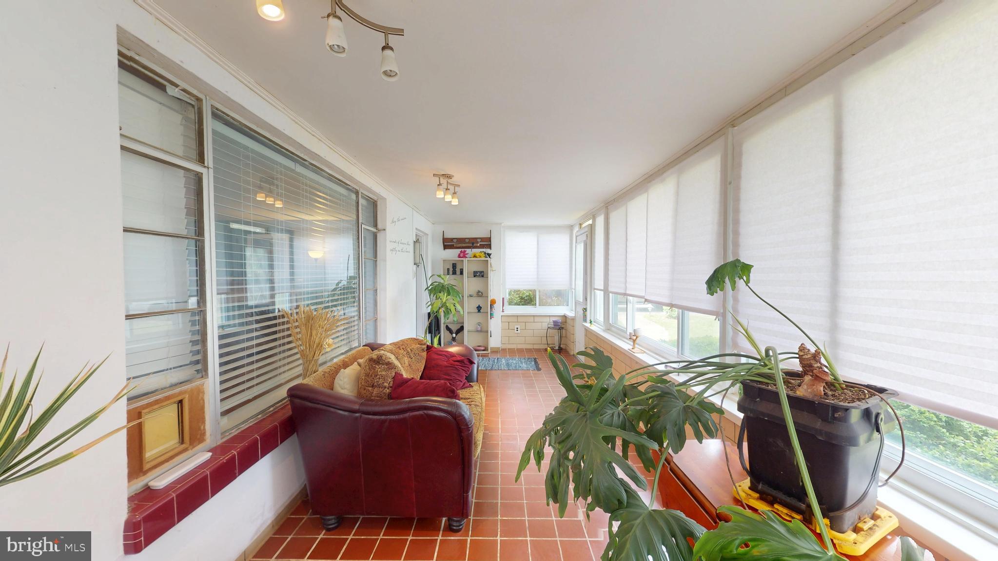 6103 Manor Road Clinton, MD 20735 - Photo 6 of 48 a view of balcony with couch