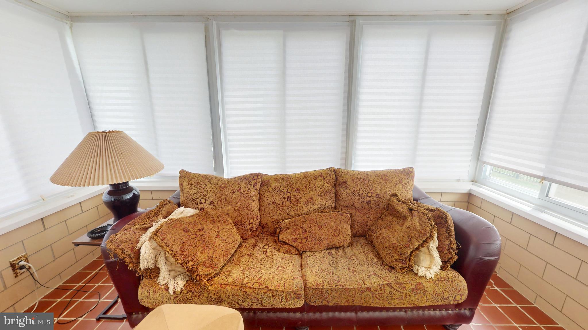 6103 Manor Road Clinton, MD 20735 - Photo 7 of 48 a living room with furniture and a window