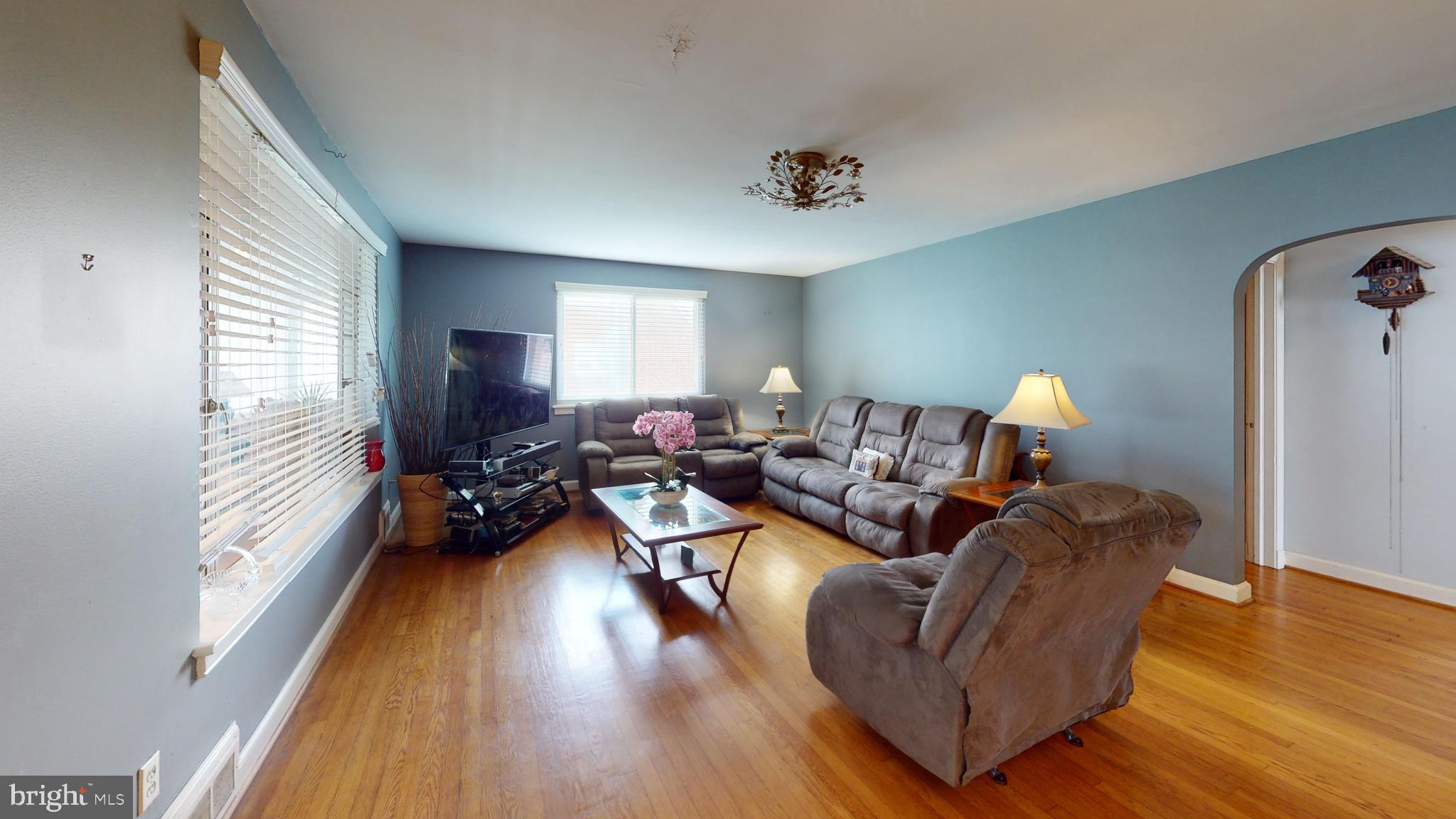 6103 Manor Road Clinton, MD 20735 - Photo 8 of 48 a living room with furniture and a wooden floor