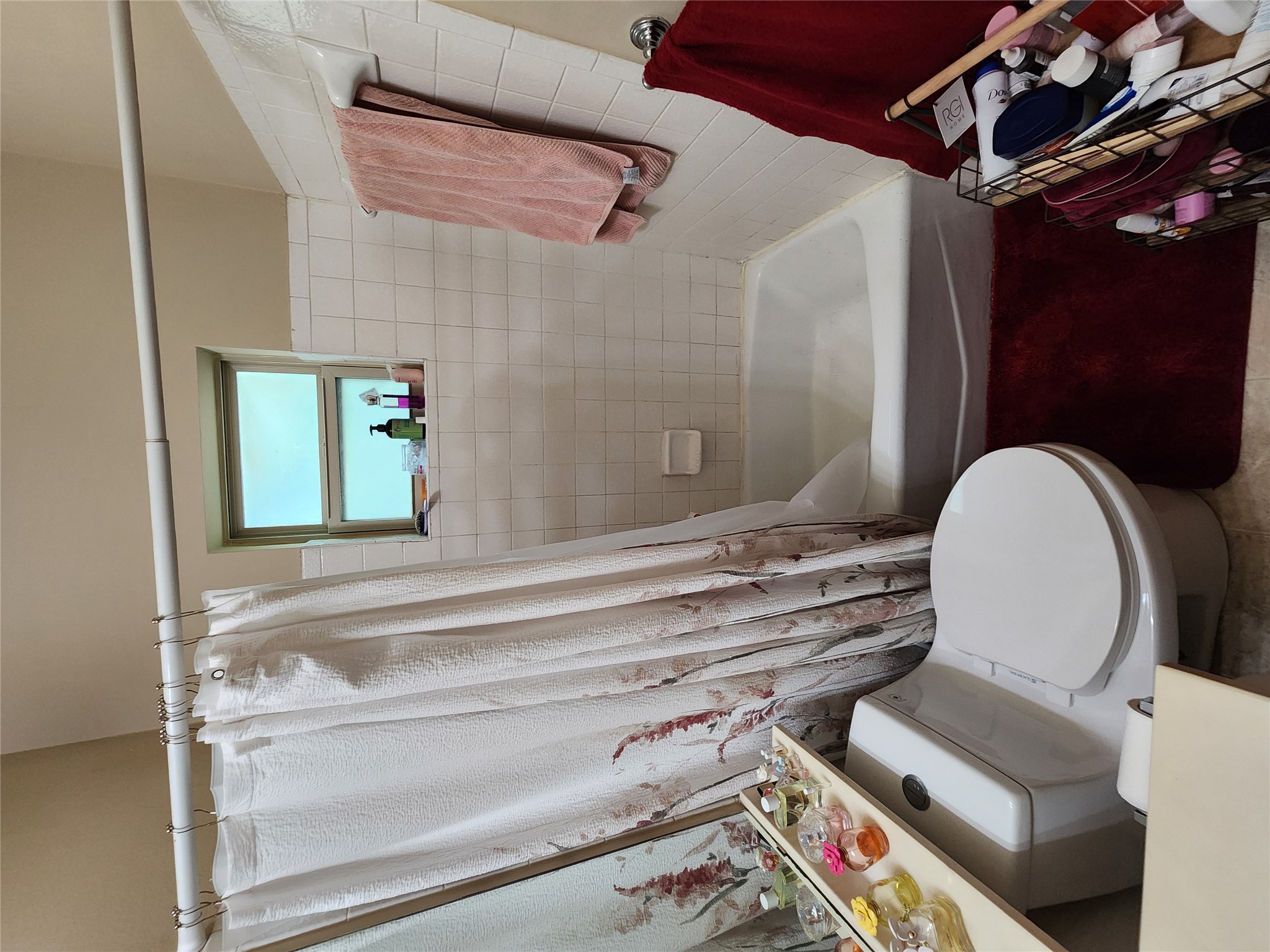 2414 Longview Street, Unit 306 Austin, TX 78705 - Photo 7 of 14 a bathroom with a sink and a toilet