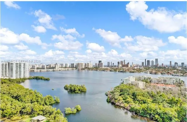 a building view with sitting space and swimming pool