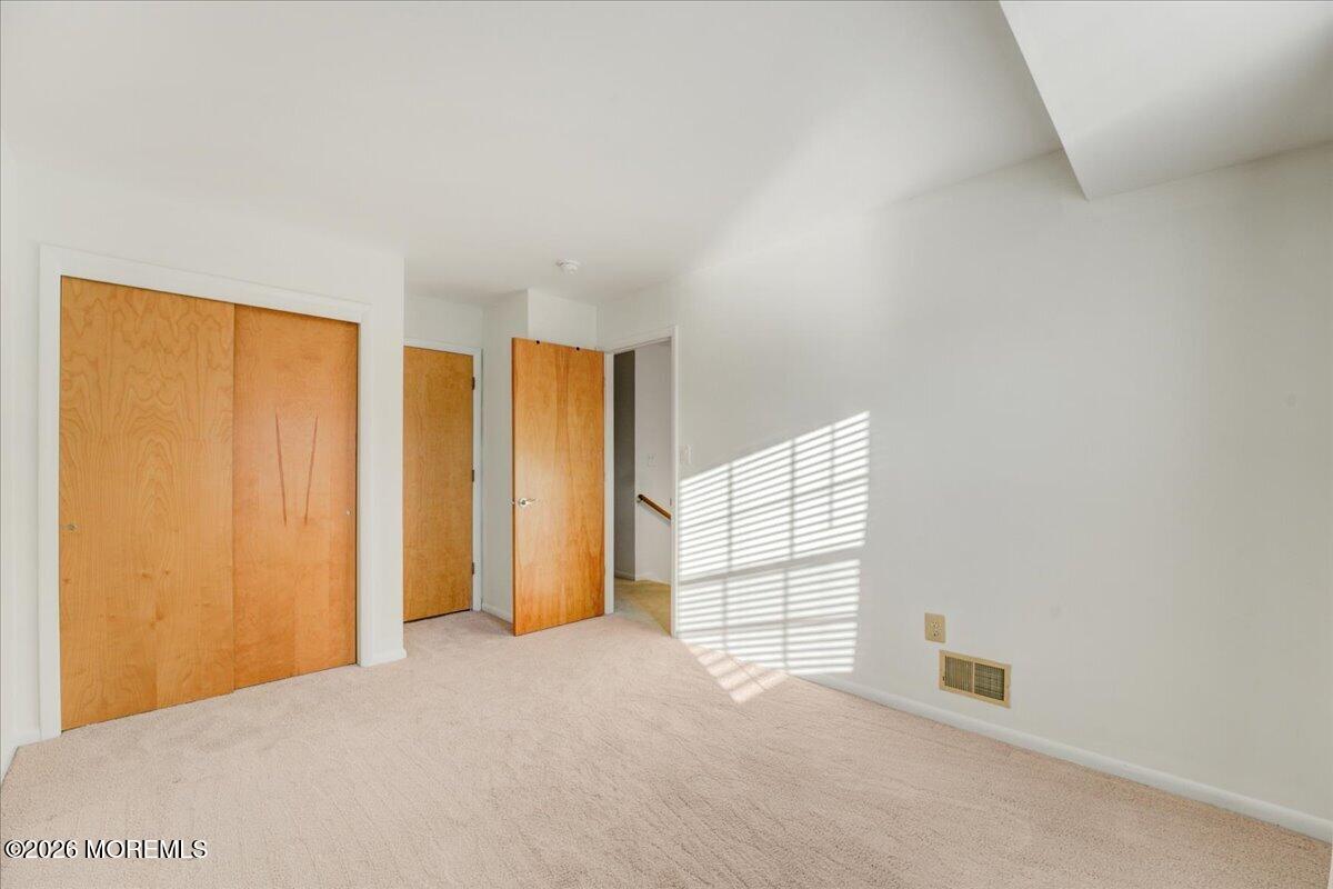 46 Stony Hill Road Jamesburg, NJ 08831 - Photo 15 of 23 a view of an empty room with a window