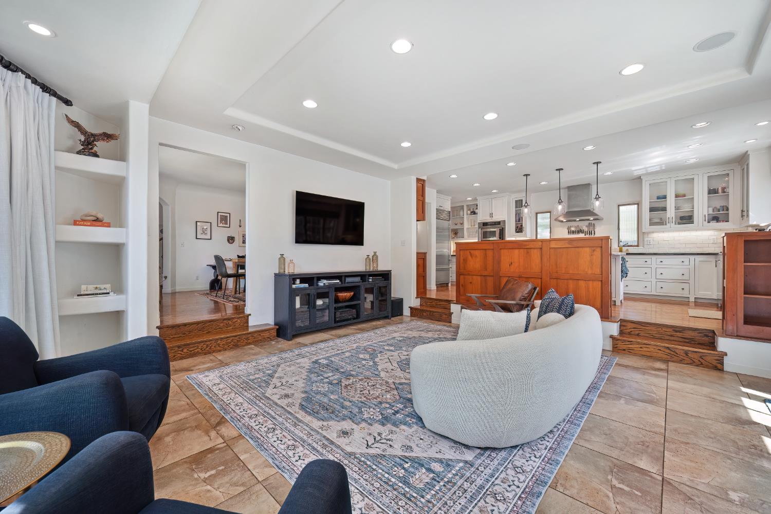 3501 Cutter Way Sacramento, CA 95818 - Photo 25 of 89 a living room with furniture and a flat screen tv