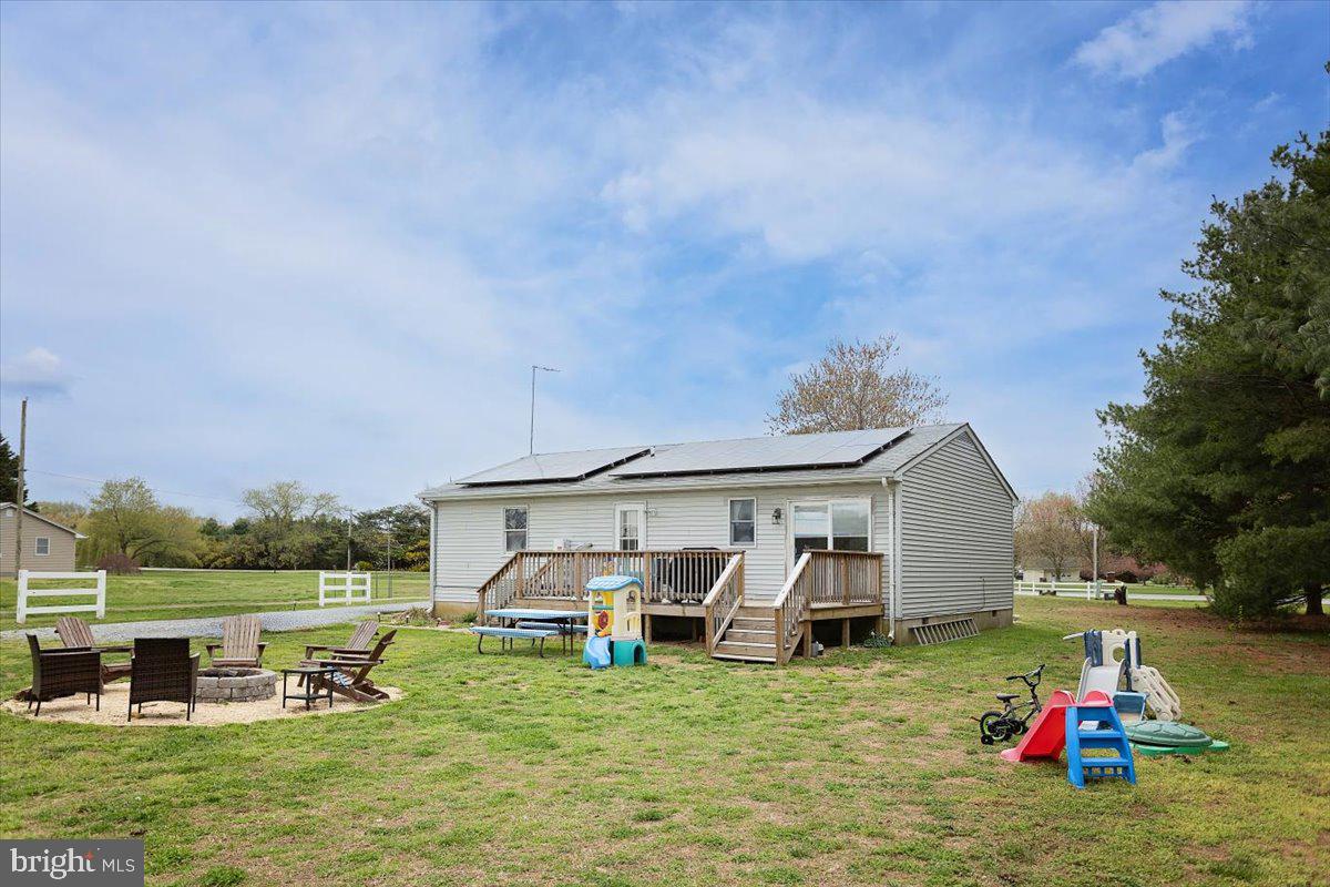 15421 Oakland Road Goldsboro, MD 21636 - Photo 16 of 20 a view of a house with backyard porch and sitting area