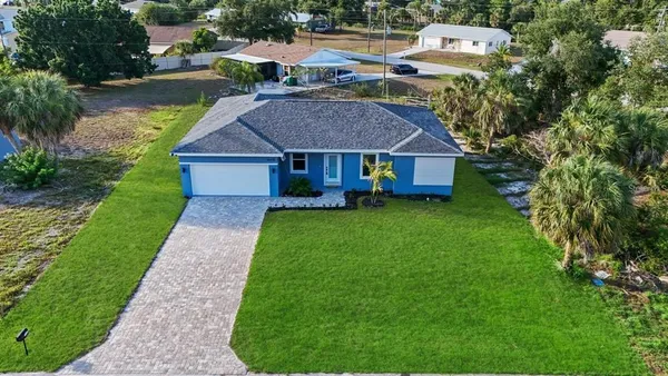 a aerial view of a house with garden