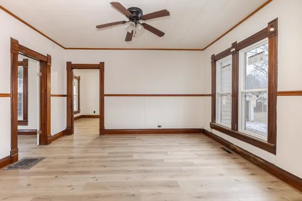 a view of an empty room with a window