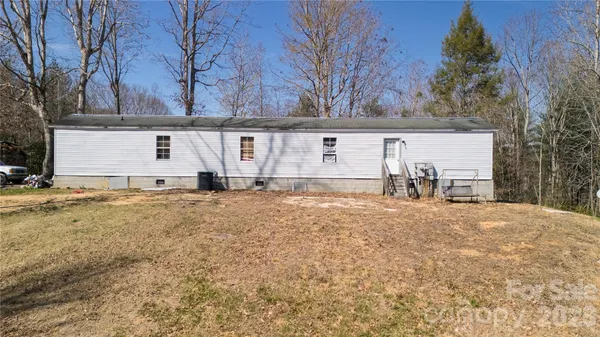a view of a backyard of a house