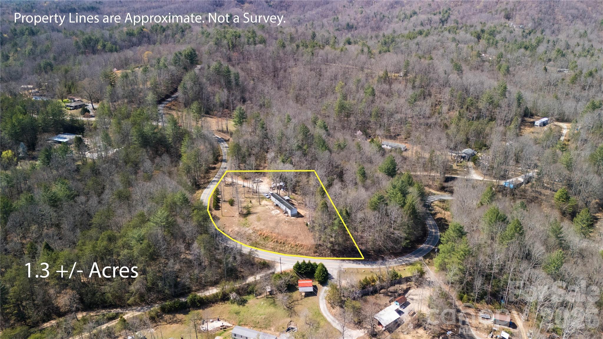1490 Glenn Carlton Road Boomer, NC 28606 - Photo 13 of 14 an aerial view of a house with a yard and garden