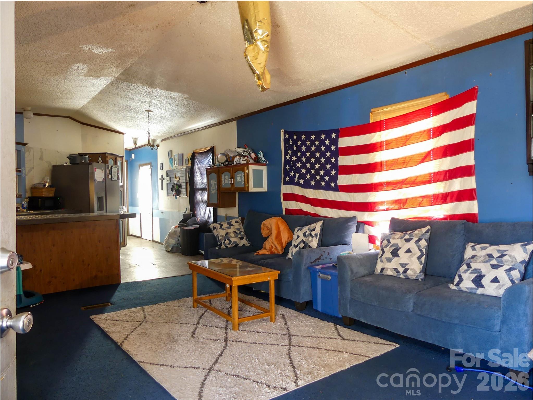 1490 Glenn Carlton Road Boomer, NC 28606 - Photo 9 of 14 a living room with furniture and wooden floor