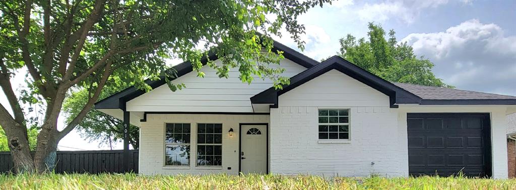 901 Wilcox Street McKinney, TX 75069 - Photo 1 of 1 a house that has a tree in front of the house