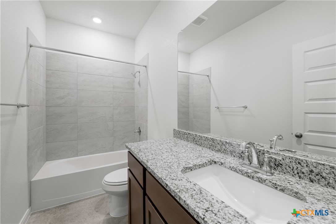 2819 Quail Rdg Lane Temple, TX 76501 - Photo 13 of 16 Please Note: These interior photos are not of the actual home but are of a completed one with a similar floor plan. Finishes, features, and layouts may vary.