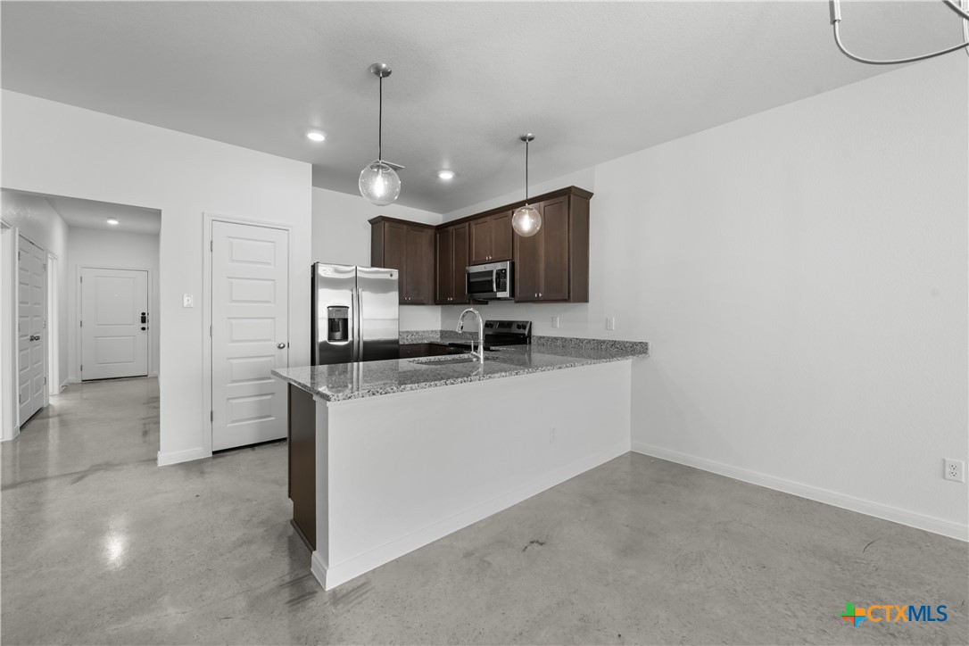 2819 Quail Rdg Lane Temple, TX 76501 - Photo 5 of 16 Please Note: These interior photos are not of the actual home but are of a completed one with a similar floor plan. Finishes, features, and layouts may vary.