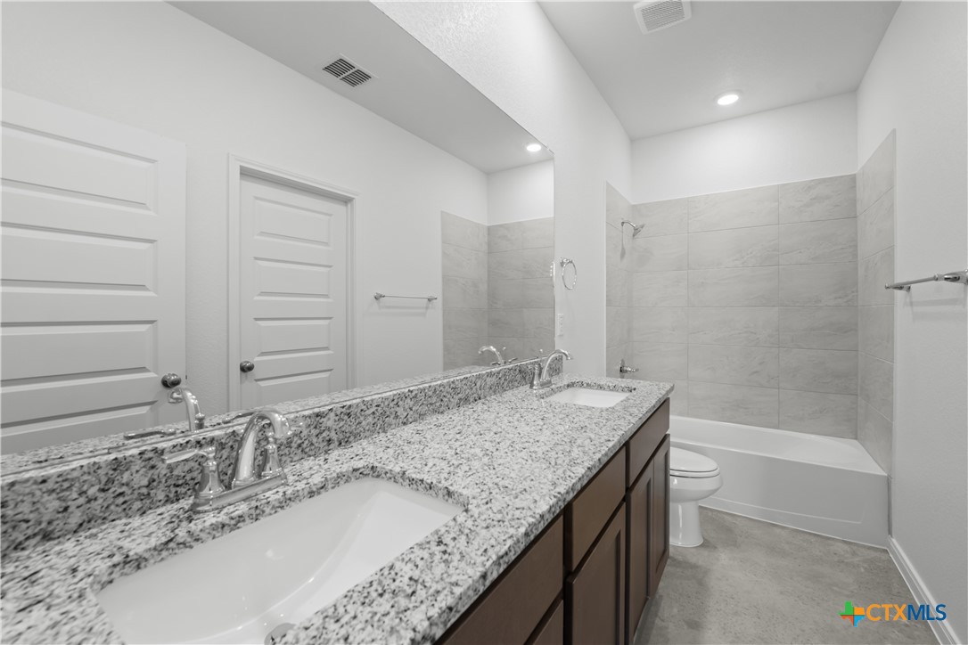 2819 Quail Rdg Lane Temple, TX 76501 - Photo 10 of 16 Please Note: These interior photos are not of the actual home but are of a completed one with a similar floor plan. Finishes, features, and layouts may vary.