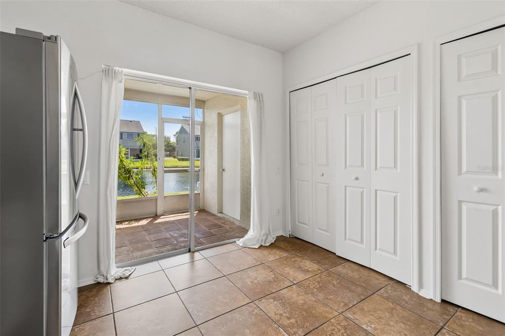 382 Countryside Key Boulevard Oldsmar, FL 34677 - Photo 18 of 58 a view of an entryway with wooden floor