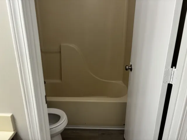 a bathroom with a sink and a bath tub