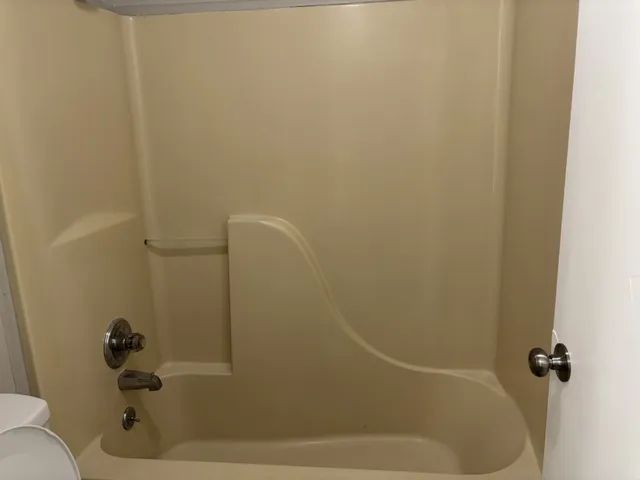 a bathroom with a bathtub