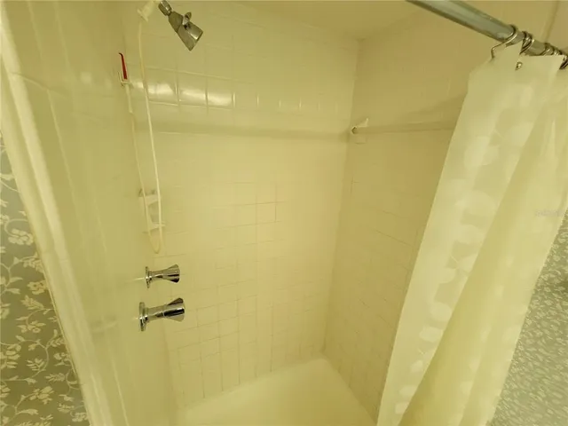 a view of a room with a window