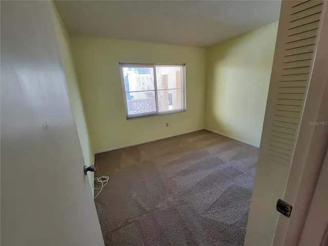 an empty room with closet