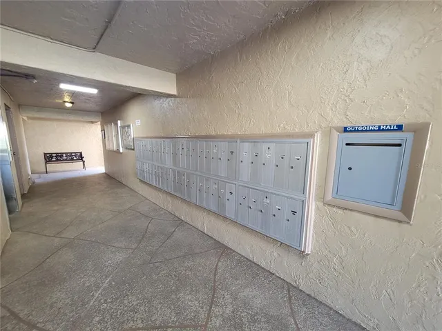a view of a patio with swimming pool