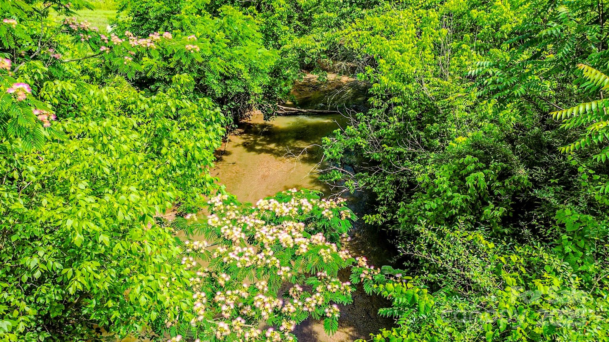 0 Cane Creek Road Union Mills, NC 28167 - Photo 11 of 25 a backyard of a house