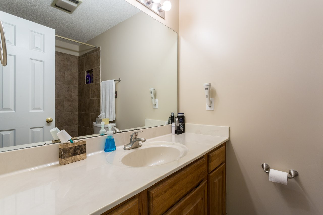6705 Twin Tree Court Raleigh, NC 27613 - Photo 13 of 20 Master bathroom with large sink and tile shower. Master Bath/Spa
