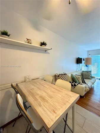 a bed room with a bed and table