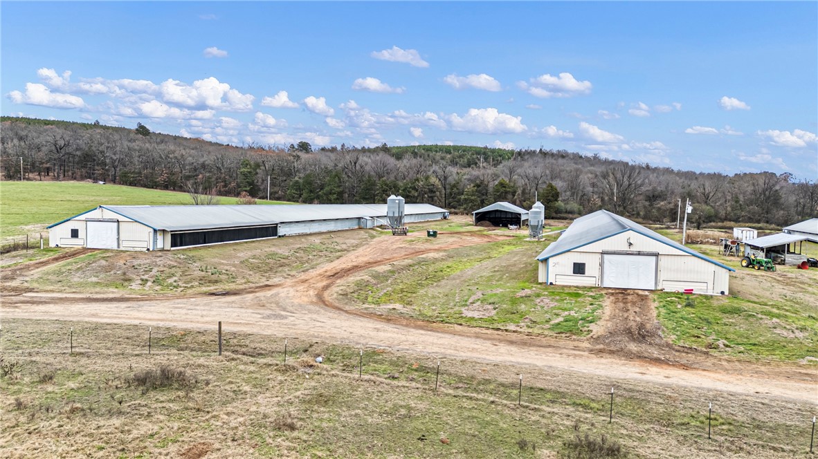 200 Sawmill Road Hattieville, AR 72063 - Photo 14 of 30 Aerial view of sparsely populated area with a forest
