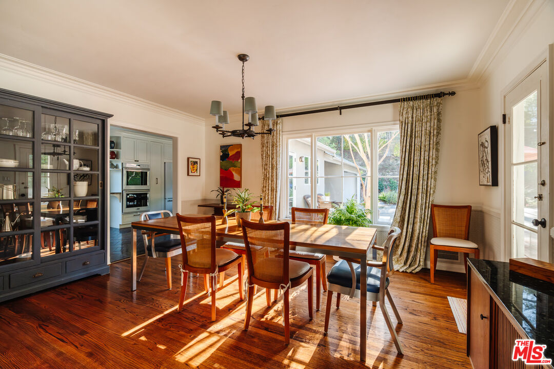 1465 Royal Boulevard Glendale, CA 91207 - Photo 11 of 67 a view of a dining room with furniture window and wooden floor