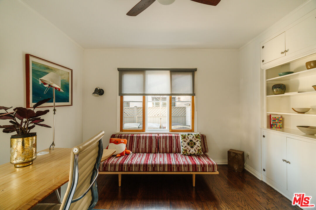 1465 Royal Boulevard Glendale, CA 91207 - Photo 24 of 67 a bed sitting in a bedroom next to a window