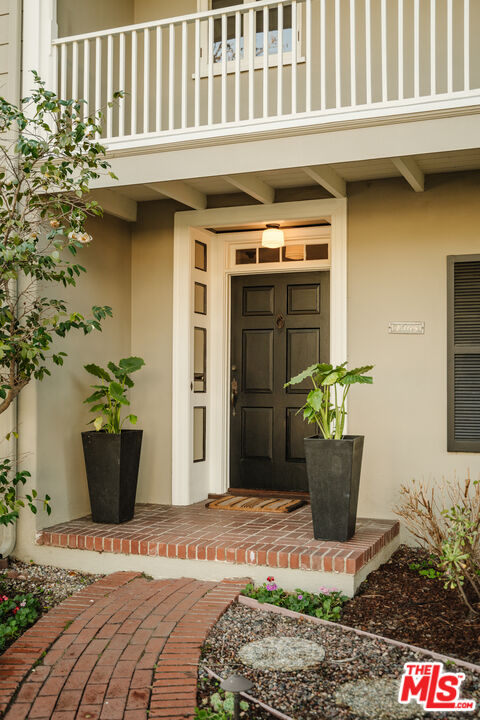 1465 Royal Boulevard Glendale, CA 91207 - Photo 3 of 67 a view of entryway of the house with potted plants