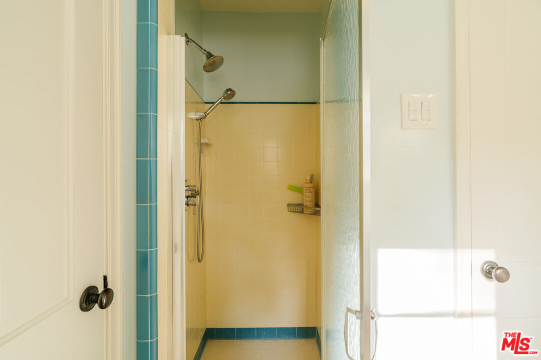 1465 Royal Boulevard Glendale, CA 91207 - Photo 43 of 67 a bathroom with a glass shower door